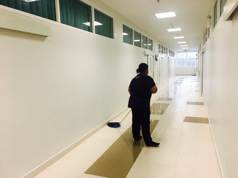 Women,Janitor,Mopping,Floor,In,School,Hallway,Classroom.,Cleaning,Services